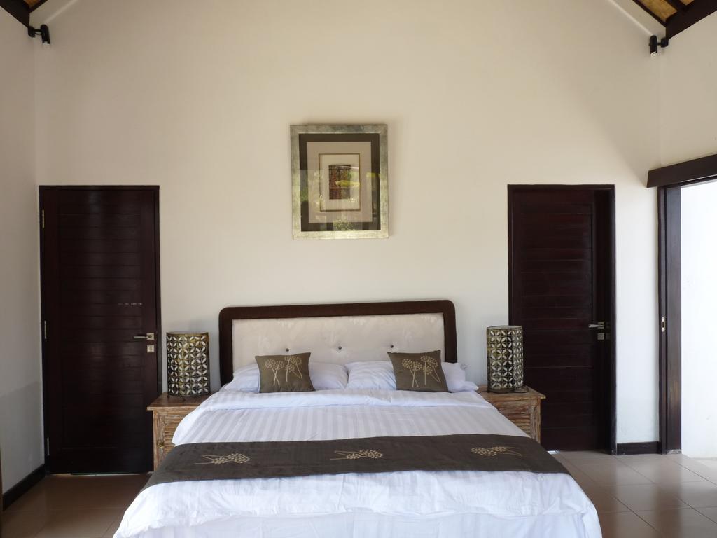 Taman Dewi Sri Villa Et Bungalow بيموتيران الغرفة الصورة