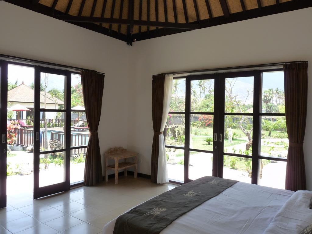 Taman Dewi Sri Villa Et Bungalow بيموتيران الغرفة الصورة