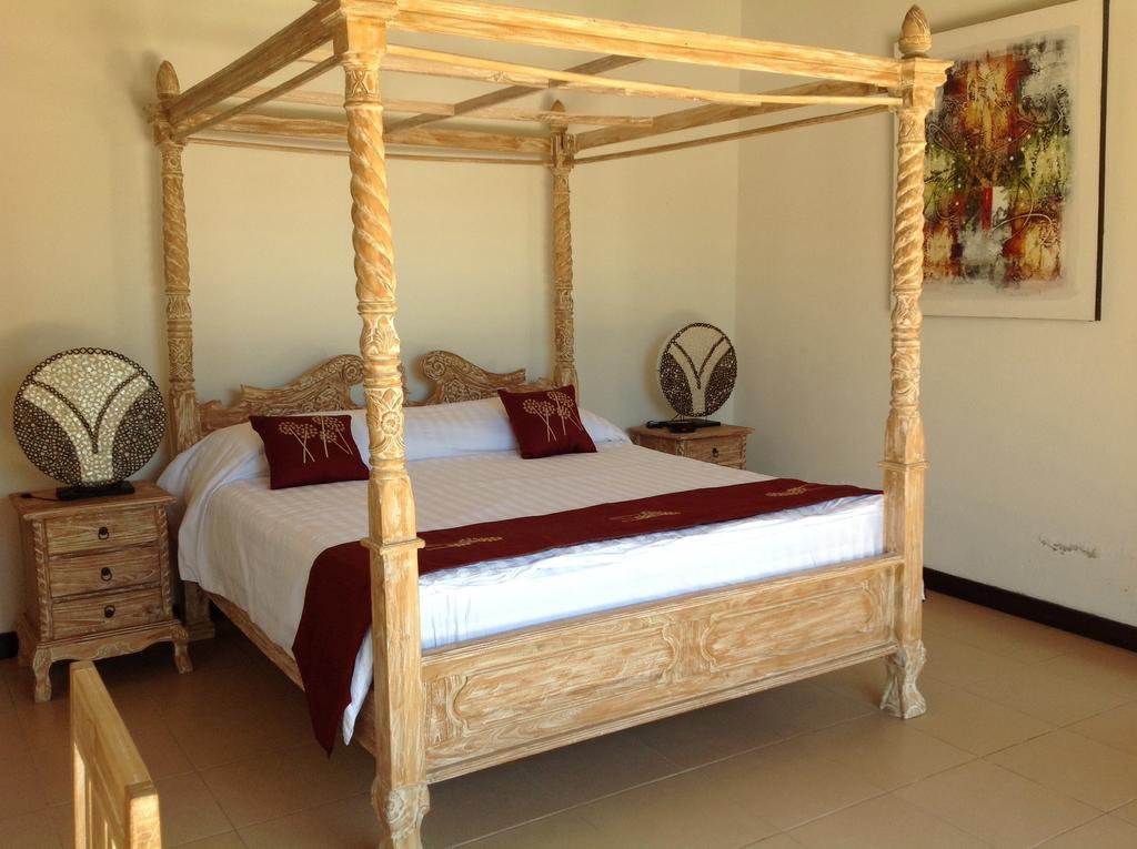 Taman Dewi Sri Villa Et Bungalow بيموتيران الغرفة الصورة